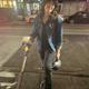 A journalist posing with the Shell e-scooter